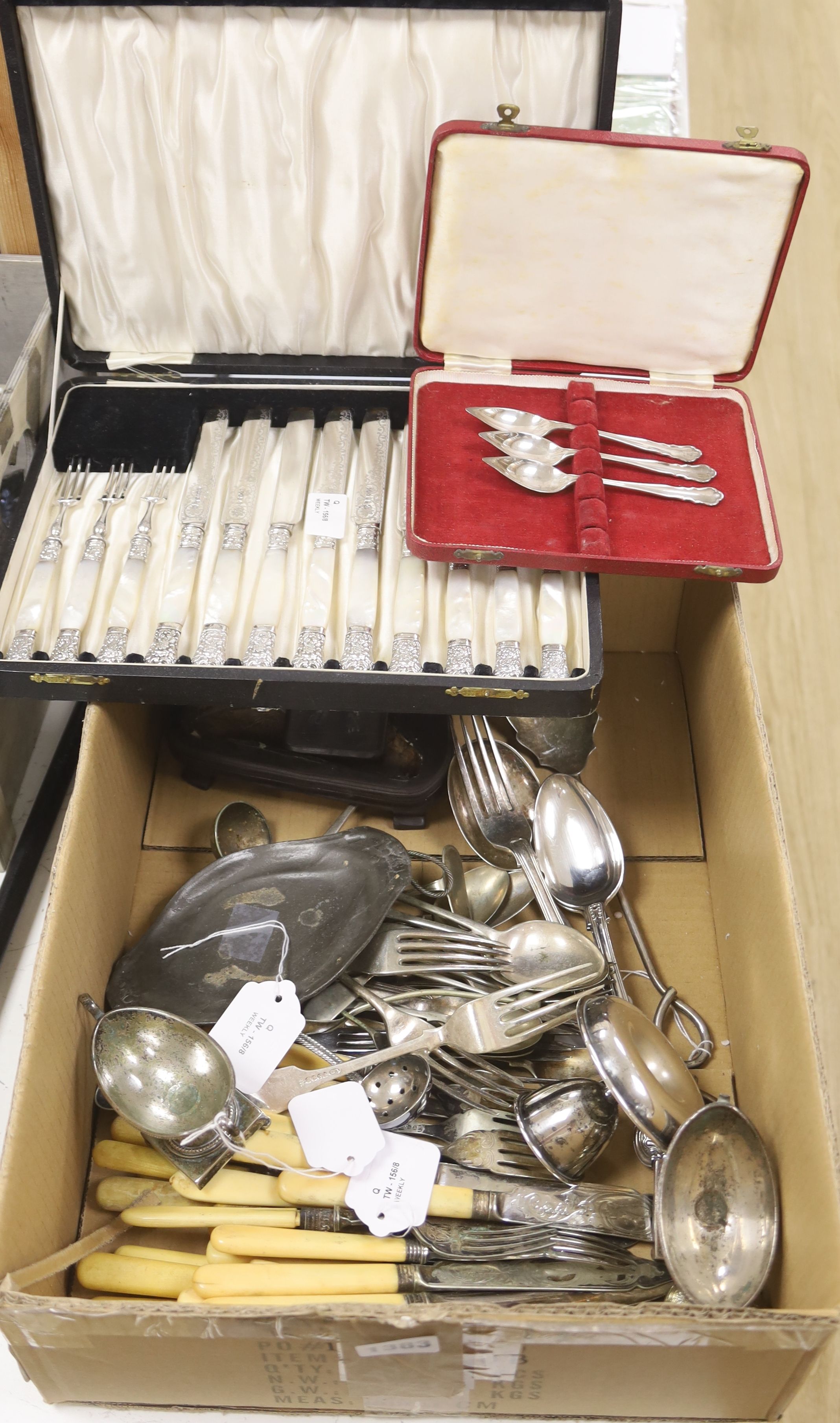 A cased set of plated and mother of pearl-handled fruit eaters and miscellaneous plated flatware and other items